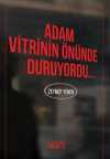 Adam Vitrinin Önünde Duruyordu